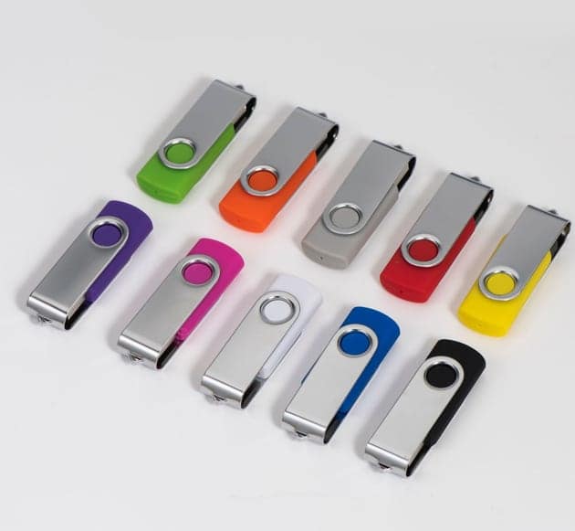 Swivel USB flash drives in a range of body colours on a white background