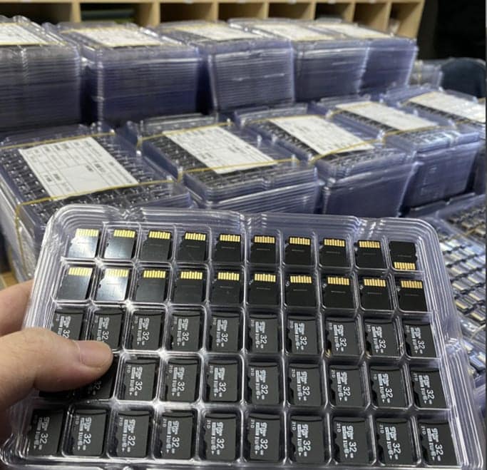TF cards in a production tray, the removable storage used in dashcams and vehicle DVRs.